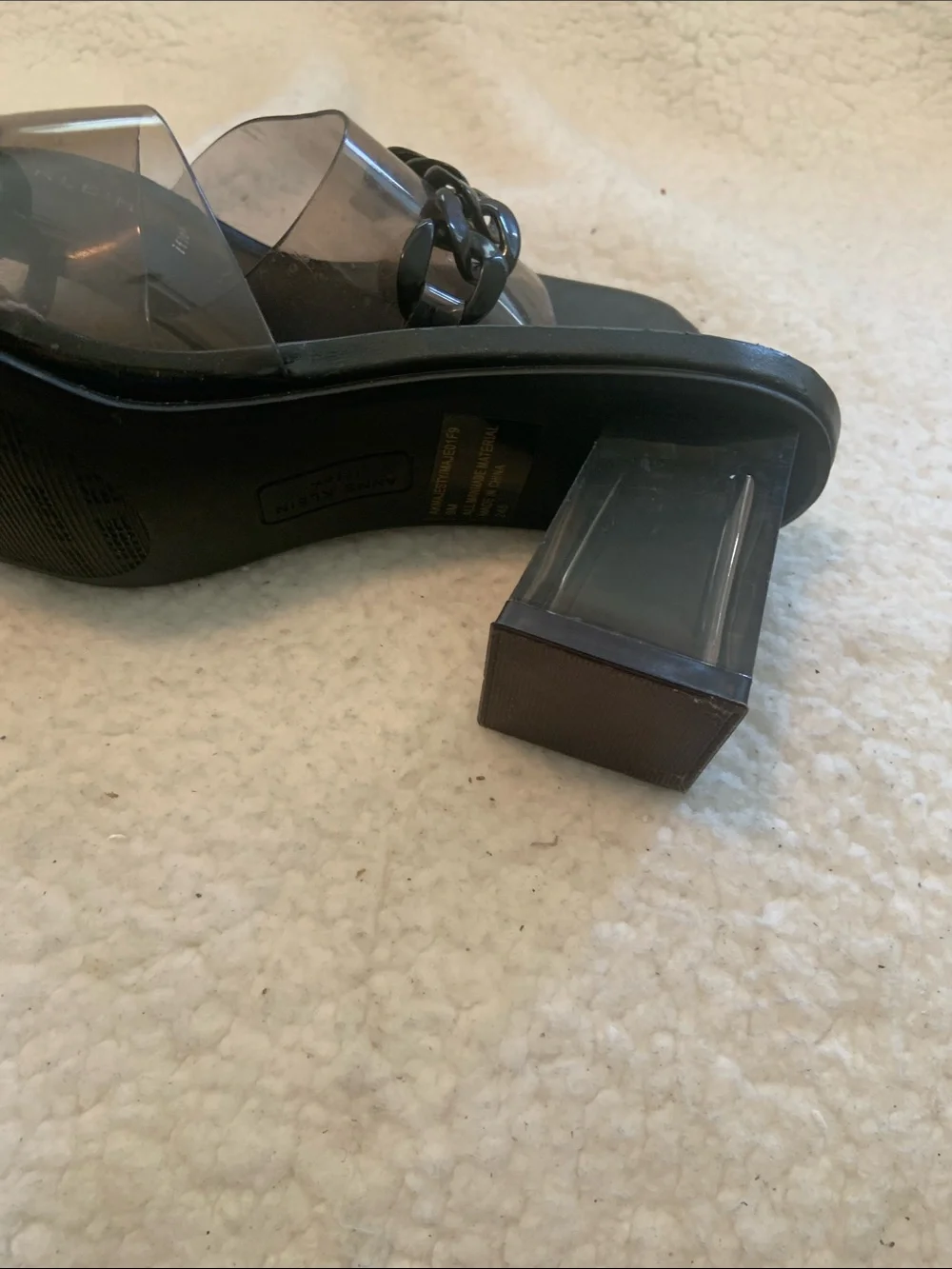 Anne Klein Black Slide Sandals with Clear Strap and Chain Accent